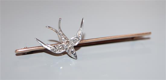 A late Victorian yellow and white metal, rose cut diamond set swallow bar brooch, 52mm.